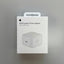 Boxed Apple 40W Dynamic Power Adapter on a gray background