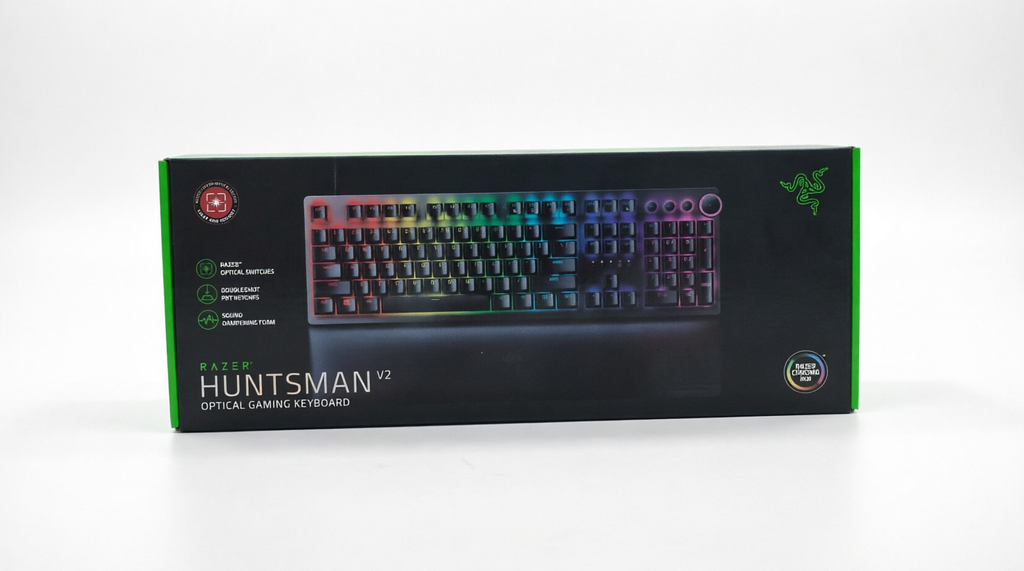 Razer Huntsman v2 Optical Mechanical Keyboard box in black with green accents and a central image of the keyboard with RGB backlighting, on a white background.