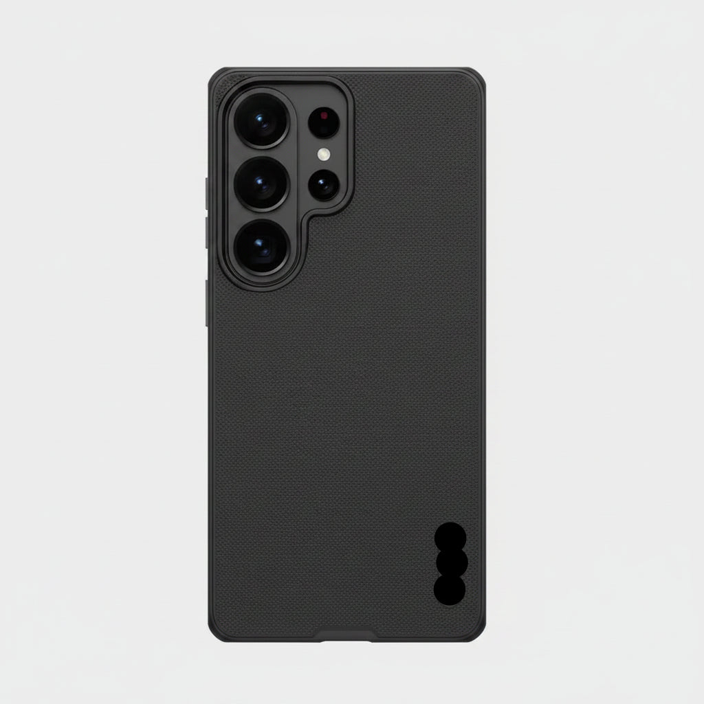 A black textured phone case with a raised camera bumper, shown from the back on a light gray background. The NUKING brand logo is visible in the bottom right corner.