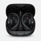 Black Soundcore wireless earbuds in their open charging case, shown from a top-down angle on a white background.