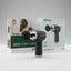 A hair dryer and its matching styling attachments shown with retail packaging on a plain white background. The box is white with green and black printed graphics, and the hair dryer itself is black and silver.