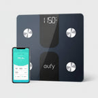 Eufy smart scale with smartphone displaying app on a white background