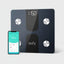 Eufy smart scale with smartphone displaying app on a white background