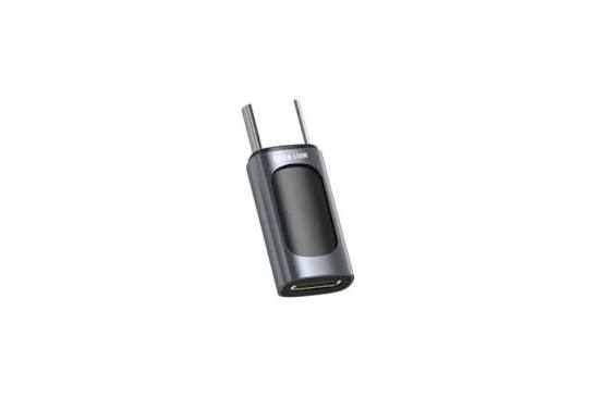 A dark gray and black USB adapter with two metal prongs, shown on a plain white background.