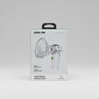 Green Lion portable nebulizer packaging box shown against a blurred sunset background, with the product pictured on the front and a carrying handle cutout at the top.