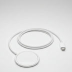 A white MagSafe-compatible wireless charging cable with a round magnetic pad and a USB-C connector, shown on a clean white background.