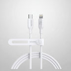 White Anker Bio Lite dual USB-C to Lightning cable with a matching cable organizer clip, shown on a solid black background.