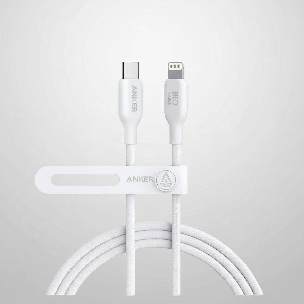 White Anker Bio Lite dual USB-C to Lightning cable with a matching cable organizer clip, shown on a solid black background.