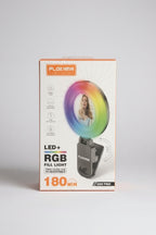 Plokama USB Pro LED+ RGB Fill Light in its original retail packaging, displayed on a reflective surface in a store setting.