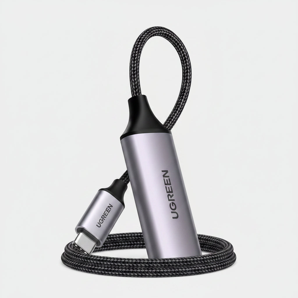 UGREEN USB-C to HDMI adapter cable with a metallic silver and black cylindrical body, braided black cable, and USB-C connector, shown on a white background.