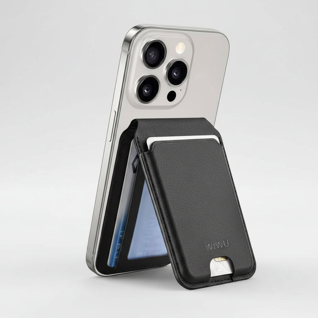 A black textured leather card holder wallet case with a silver metal card slot, shown attached to a silver smartphone on a white background.