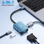4-in-1 expansion device with multiple ports connected to a laptop on a light blue background