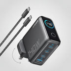 Anker charging station with multiple USB ports and cables on a white background