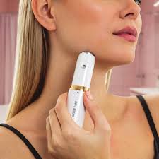 A woman holding a white and gold beauty device against her neck, shown in a close-up lifestyle shot.